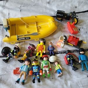 Lot of Playmobil figures boat motorcycle accessories